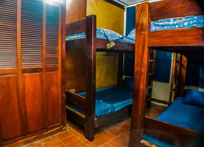 a bunk bed room with two bunk beds in it at Rancho Mayayi Beach house in San Miguel