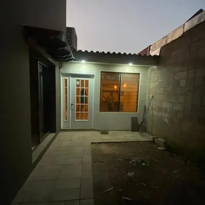 a house with a door and a window on a building at Casa Miramar, relaxation and work
