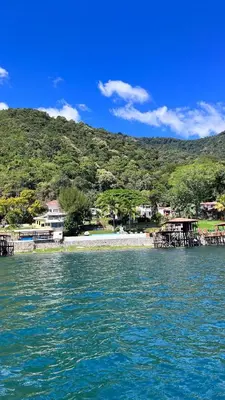 a view of a body of water with a beach at Quinta Avanti Villa-Coatepeque Lake-14 guest in Santa Ana