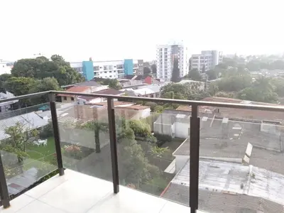 a balcony with a view of a city at Apartamento YOU D6 in San Salvador