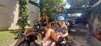 a group of people sitting on their bikes at Hotel Caleta in San Miguel