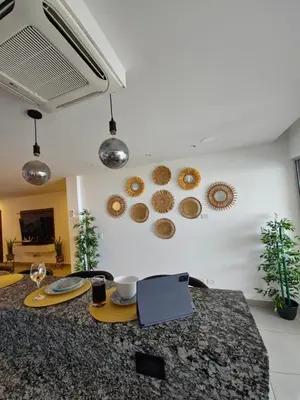 a kitchen with a counter with donuts on the wall at Kailani, Costa del Sol in San Luis La Herradura