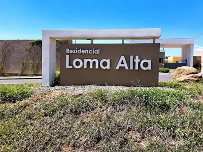 a sign for the lomo atria sign in front of a building at Via Trip House - Sonsonate in Sonsonate