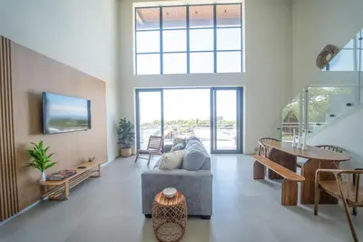 a living room with a couch and a table at San Blas Loft in Playa San Blas