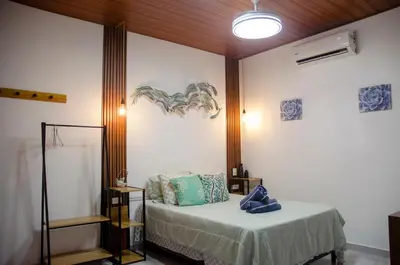 a room with a bed in a room at Sunzal Tropical 9 in Tamanique