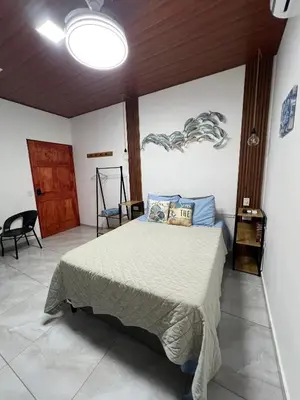 a bedroom with a bed in a room at Sunzal Tropical 9 in Tamanique