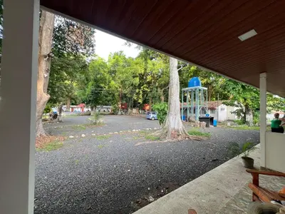 a view of a playground from the porch of a house at Sunzal Tropical 9 in Tamanique