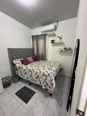 a bedroom with a bed in a room at Villa panamericana san miguel in San Miguel