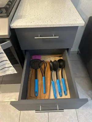 a drawer in a kitchen with utensils in it at Villa panamericana san miguel in San Miguel
