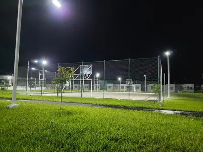 a tennis court at night with lights on it at Casa Nueva San Miguel in San Miguel