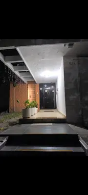 a view of a building with a hallway with a door at Casablanca in San Salvador