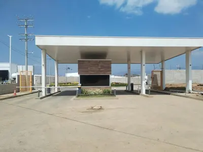 an empty gas station with a large roof at House Haciendas del Mediterraneo in Ahuachapán