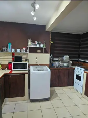 a kitchen with a dishwasher a sink and a stove at KR apartment CENTRO HISTÓRICO, SAN SALVADOR, TRES HABITACIONES 4 CAMAS parking wifi netflix VIX y mas in San Salvador