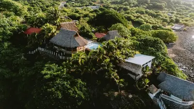 an aerial view of a resort in the jungle at Punta Mango Villas in La Periquera