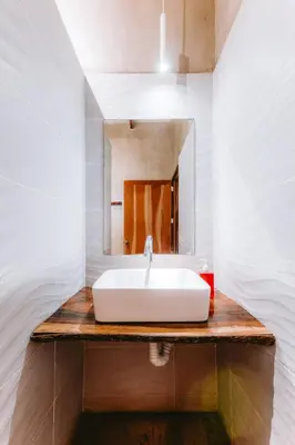 a bathroom with a sink and a mirror at Punta Mango Villas in La Periquera