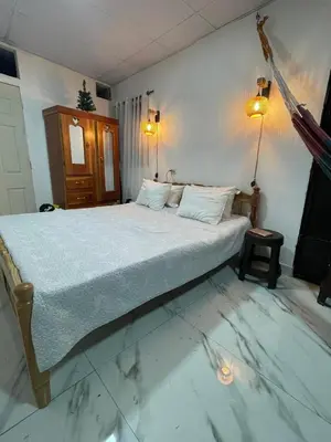 a bedroom with a large bed in a room at The Best Place for You to Relax