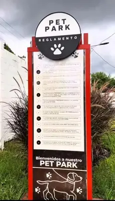 a sign for a pet park with a pet park sign at Home Sweet Home in San Miguel