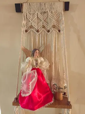 a doll in a red dress sitting on a shelf at La Joyona, Cozy House, Atiquizaya