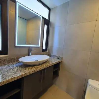 a bathroom with a sink and a mirror at Tuscania 203 in Zaragoza