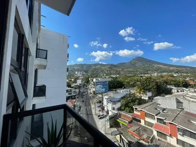a view of a city from a balcony at Enjoy San Salvador in Torre 91 in San Salvador