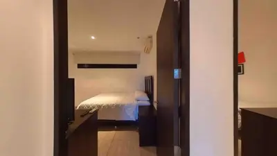 a small bedroom with a bed in a room at Enjoy San Salvador in Torre 91 in San Salvador