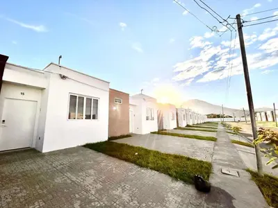 a row of white houses on a street at Nuevo San Miguel in San Miguel