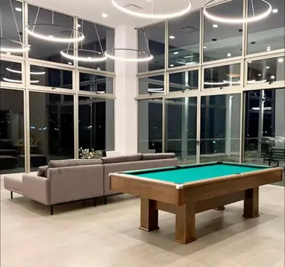 a living room with a pool table in it at Torre Puerta el Alma-Luxury Stay-Frente Mall Multiplaza in Ceiba de Guadalupe