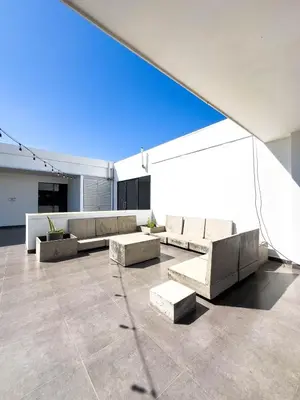 a living room with couches and tables in a building at Anthonini's Apartment 6 guests San Salvador in San Salvador