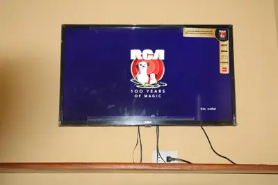 a television screen with a ncaa years of magic at Habitacion Costabay in El Zapote