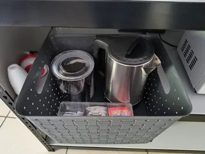 a basket filled with utensils in a drawer at Apartment in Playa Las Flores La Libertad in La Libertad