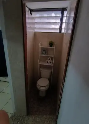 a small bathroom with a toilet in a room at Apartment in Playa Las Flores La Libertad in La Libertad