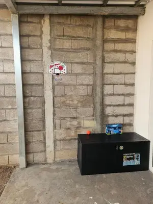 a basketball hoop attached to a brick wall at Casa Márquez in San Miguel