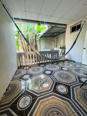 a staircase in a building with a tiled floor at Agradable vivienda vacacional in Suchitoto