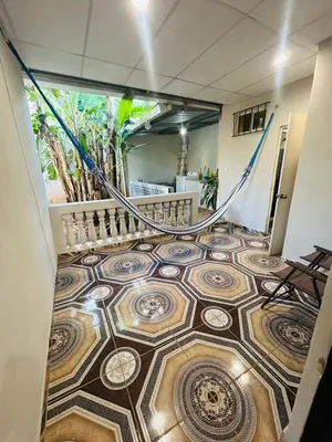 a room with a staircase with a tiled floor at Agradable vivienda vacacional in Suchitoto
