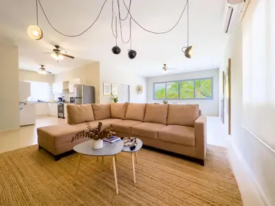 a living room with a couch and a table at Boa Mare in Nanastepeque