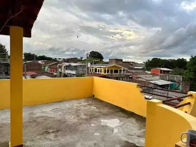 a balcony with a view of a city at Modern colonial house