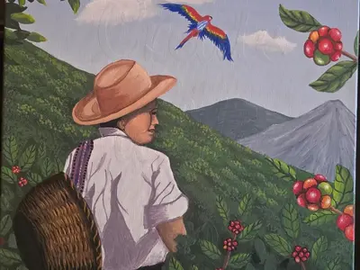 a painting of a man in a hat watching a bird at Casa Juanita Juayua in Juayúa