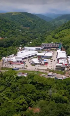 an aerial view of a large building in a field at Oceanview Loft Mare in Playa San Blas