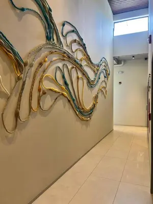 a painting of a fish on a wall in a hallway at Oceanview Loft Mare in Playa San Blas