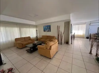 a living room with two couches and a table at House in Costa del Sol with beach access 5 bedrooms in Marcelino