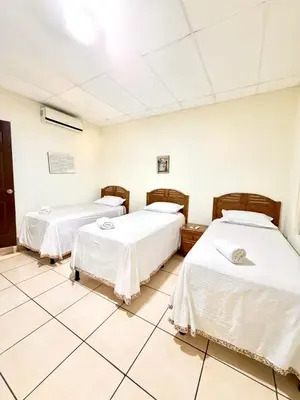a hospital room with two beds in it at Hotel Pablo Tesák in San Vicente