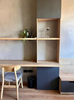a wooden desk with a chair and a table at Modern and Stylish Studio Near Parks El Espino District in San Salvador