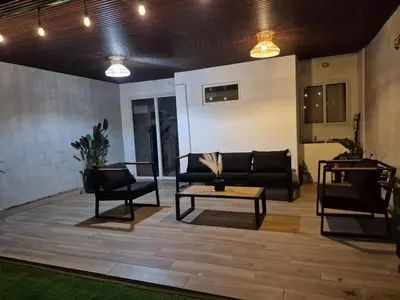 a living room with a couch and a coffee table at Casa Mia en San Miguel