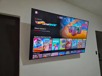 a flat screen tv hanging on a wall at Casa Luna Villa Verde State in Santa Ana