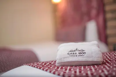 a white towel sitting on top of a table at Casa 1800 Suchitoto Boutique in Suchitoto