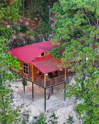 an overhead view of a house with a red roof at Villa Verde in Perquín