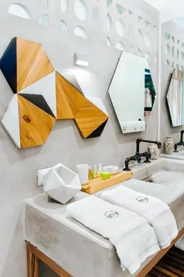 a bathroom with a sink and a mirror at Puro Surf Hotel & Performance Academy in El Zonte
