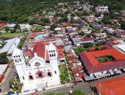 an aerial view of a church in a town at Vista Los Volcanes Hotel y Restaurante in Juayúa