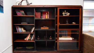 a book shelf with many books on it at Hotel Europa in San Miguel