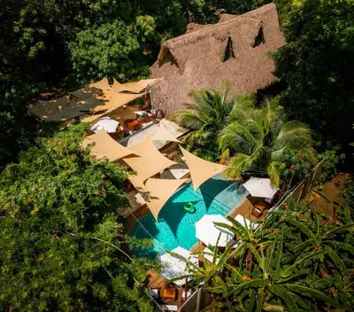 an overhead view of a resort with a swimming pool at Hotel Michanti in El Zonte